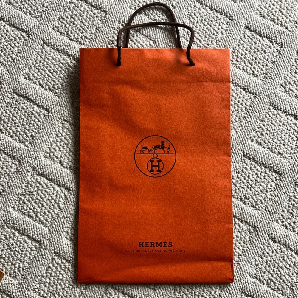 Hermēs paper shopping bag